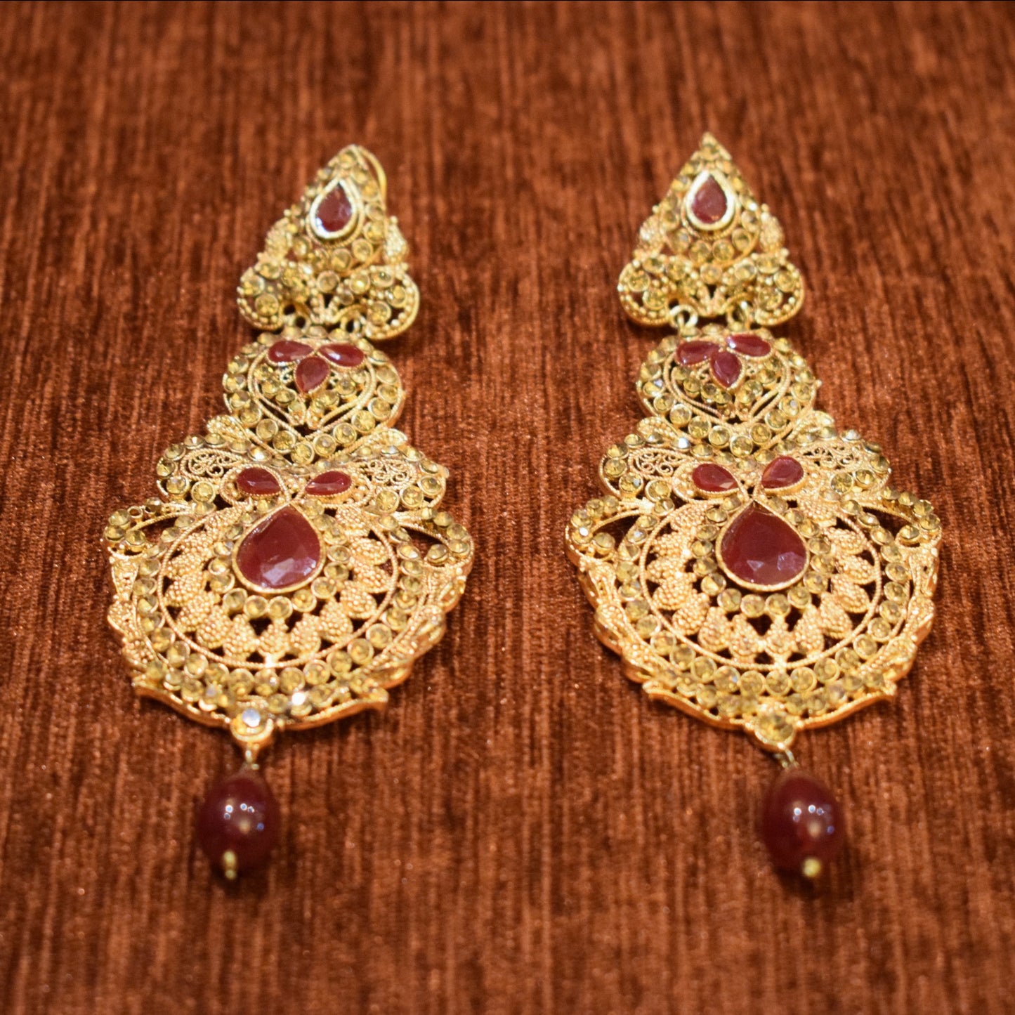 Red Gem Jhumkas Earrings - Gold