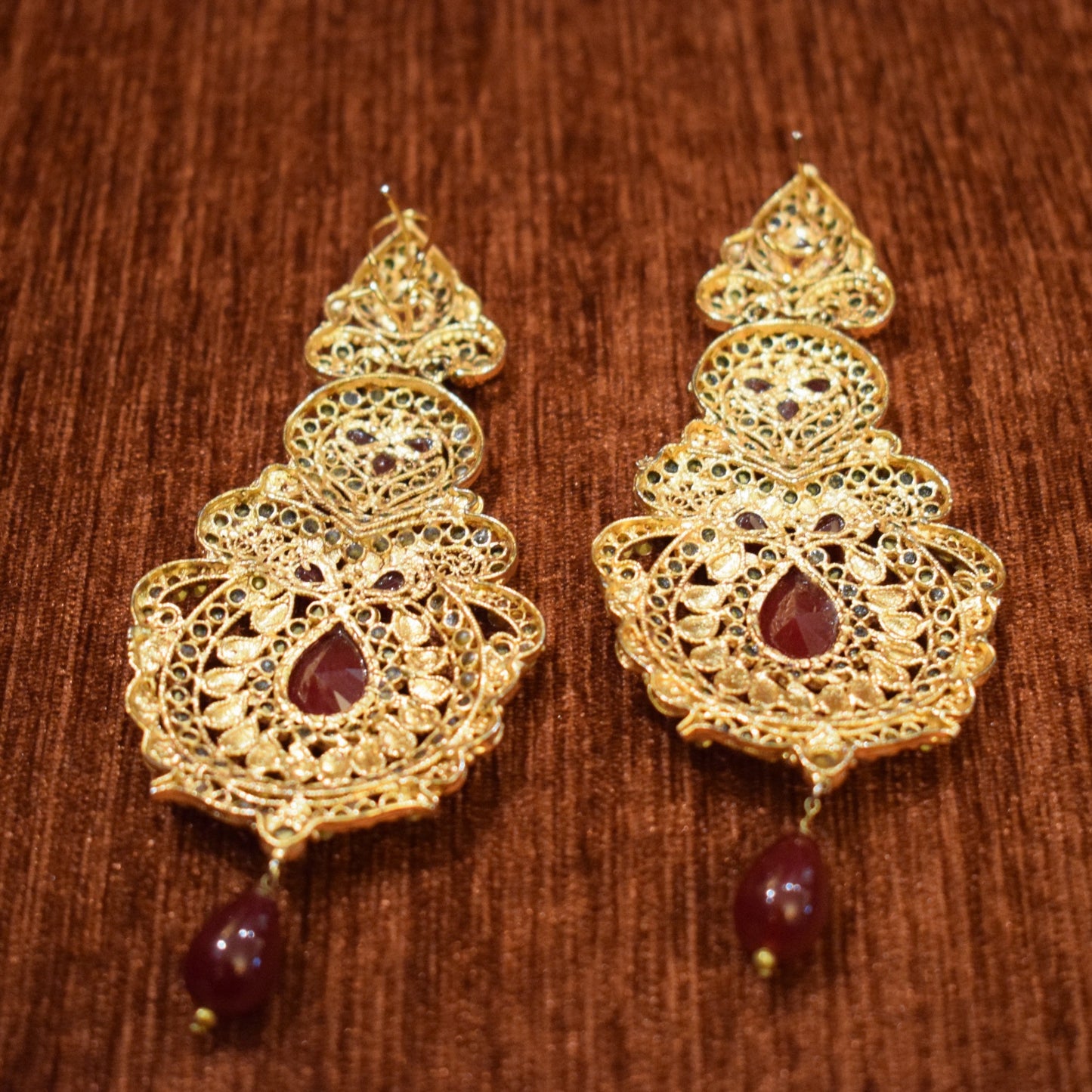 Red Gem Jhumkas Earrings - Gold